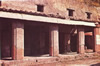 A particular of the columns of the house on Decumano Massimo